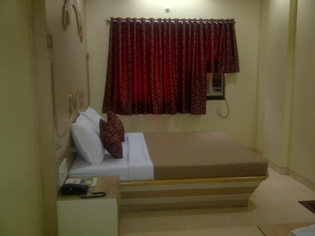Om Sai Palace Hotel Pune Værelse billede